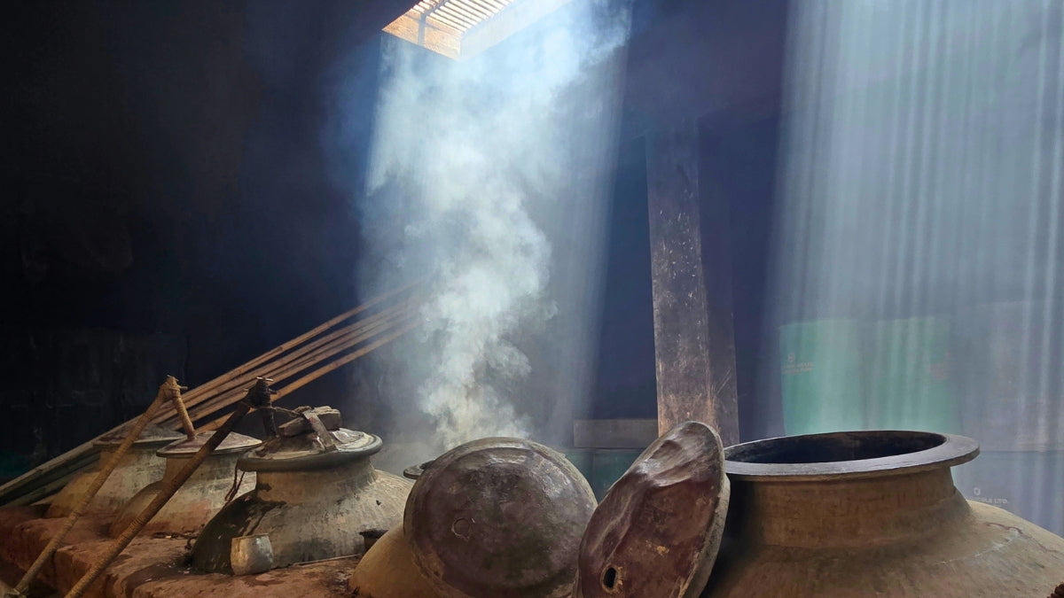 Kannauj attar distillation workshop with copper deg