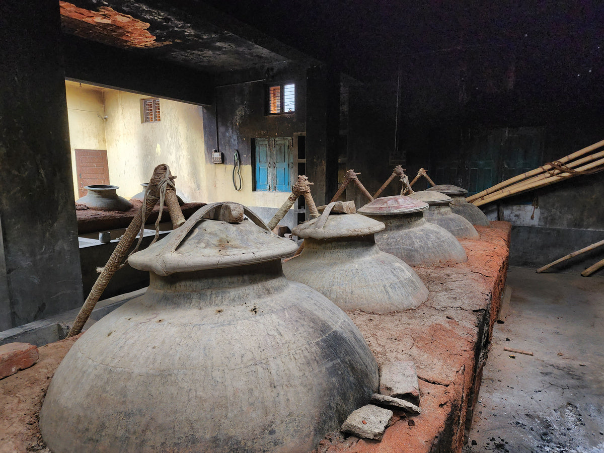 Traditional hand-hammered copper degh used in Kannauj attar distillation
